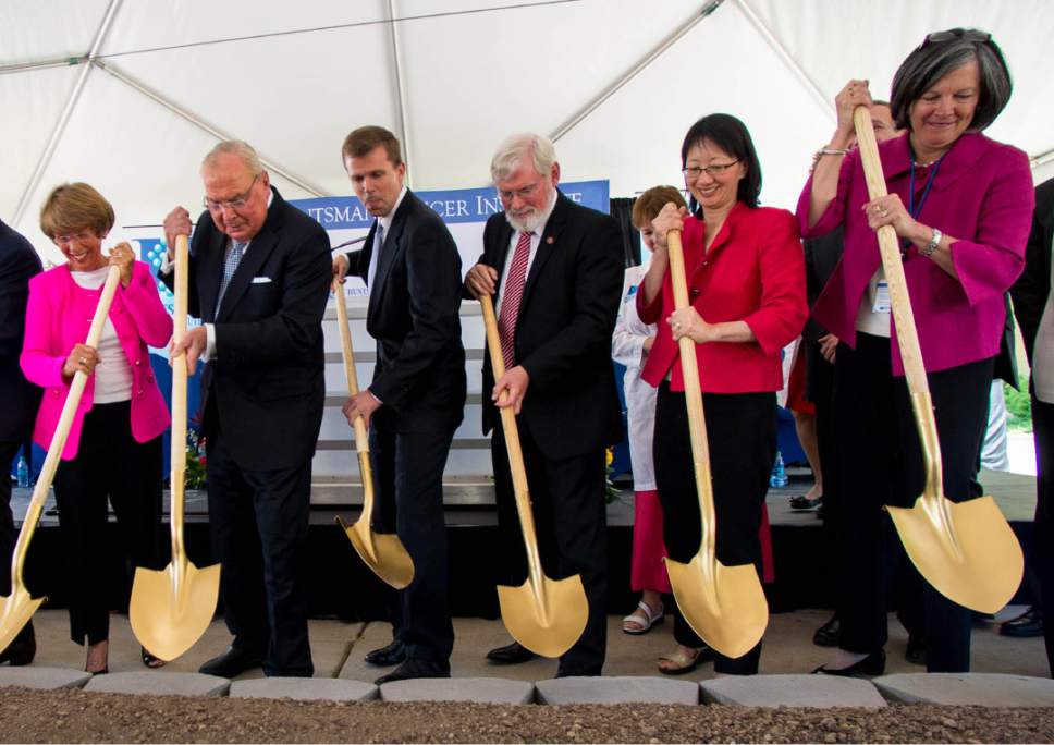 File photo | Trent Nelson  |  The Salt Lake Tribune
Members of the Huntsman family joined University of Utah President David Pershing, Health Sciences Senior Vice President Vivian Lee and Huntsman Cancer Institute Director Mary Beckerle in June 2014 to break ground on the institute's new wing, the Primary Children's and Families Cancer Research Center, now slated to open in June. Earlier this month, the Huntsmans clashed with Pershing and Lee after Lee fired Beckerle, who Pershing has since reinstated. Left to right, Karen Huntsman, Jon Huntsman Sr., David Huntsman, Pershing, Lee and Beckerle.